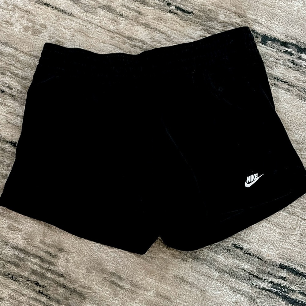 Women’s black Nike shirts medium mesh look